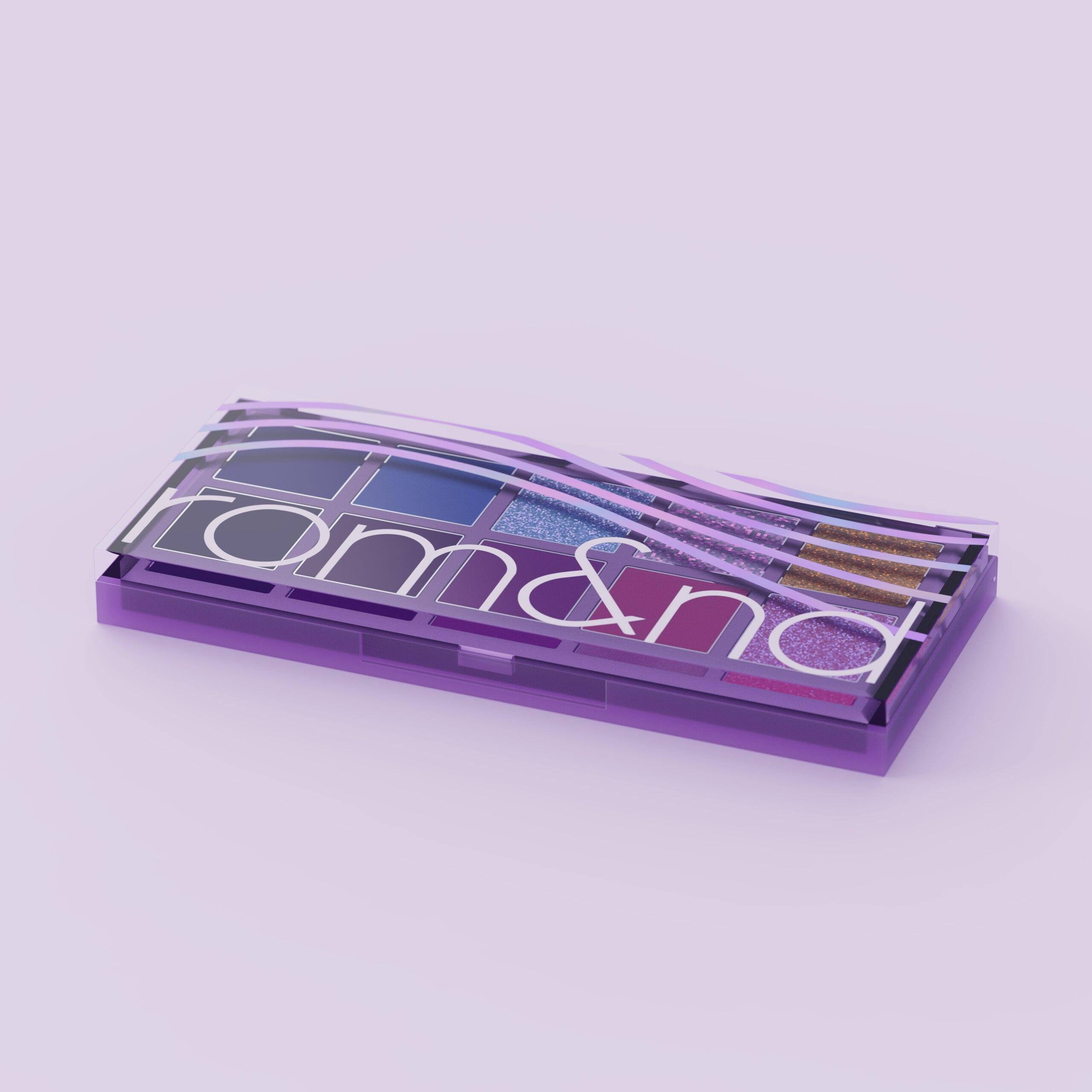 Closed rom&nd x Kpop Demon Hunters eyeshadow palette with the logo and a Hommoon-inspired pattern on the lid