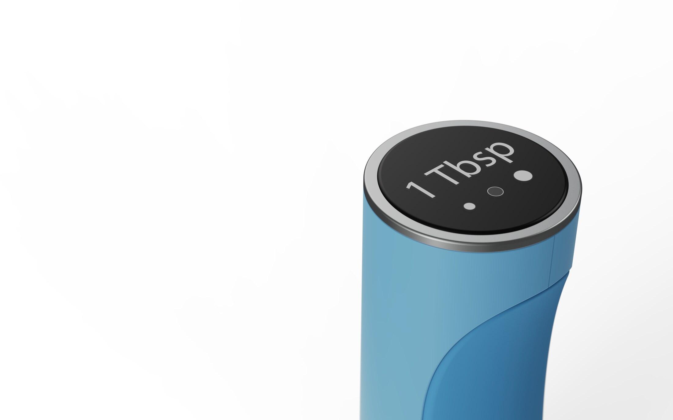 Close-up of the grinder's top touchscreen display showing a 1 Tbsp dispense amount